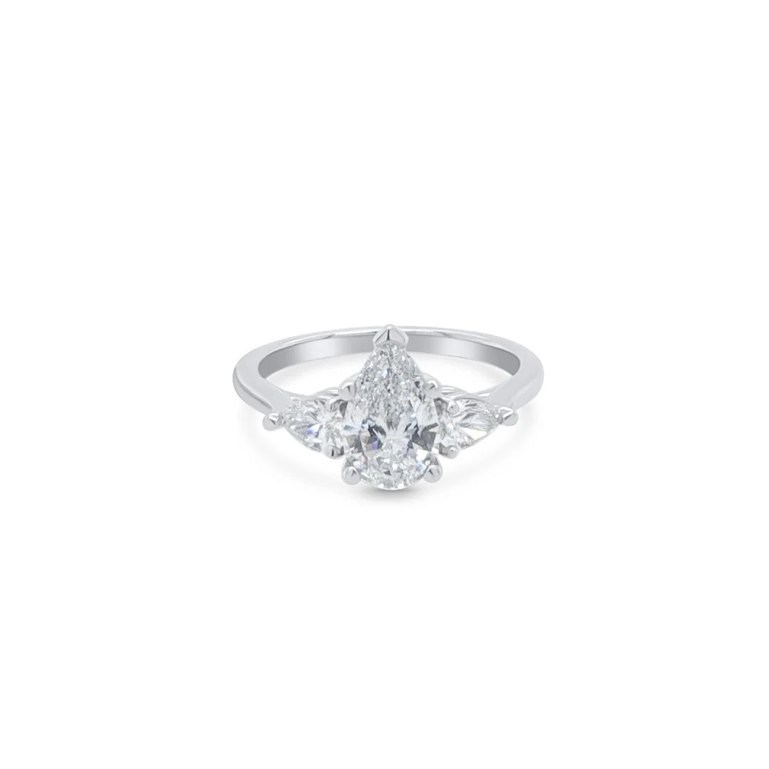 1.36 Carats Pear Shape Lab Grown Diamond Three Stone Engagement Ring